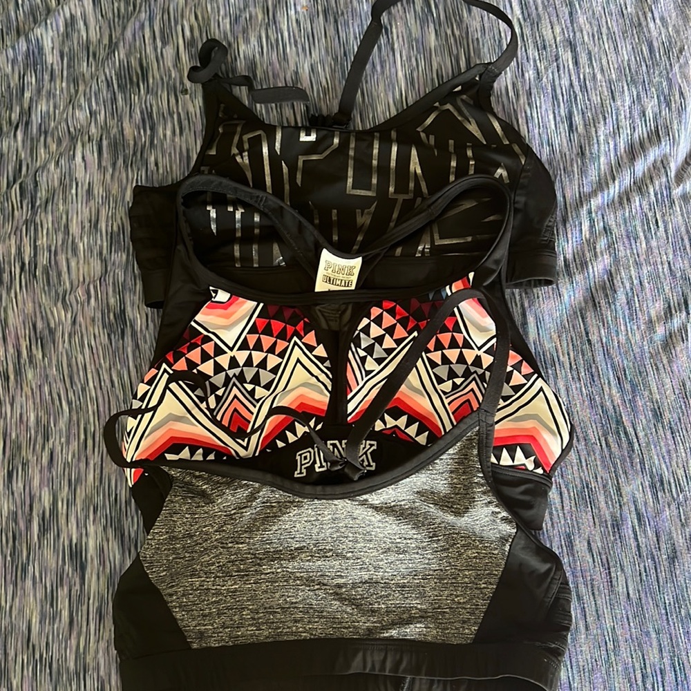 3 pink sports bras made for high impact.